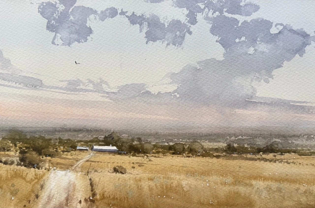 plein air painting of watercolor prairie with dramatic storm clouds